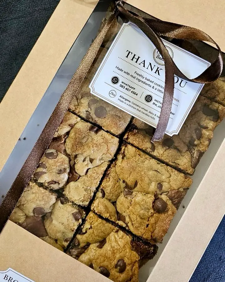 A kraft gift box of Brown Butter Brookies tied with a ribbon
